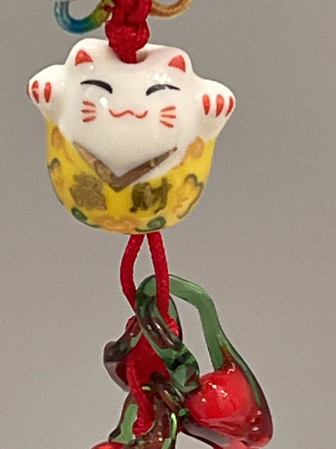 Good Luck Happy Cat charm with Glass Pepper/Tassel