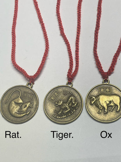 Twelve Brass Zodiac Pendant Necklace (Red & Black Color)